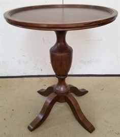 Round mahogany table by Concepts