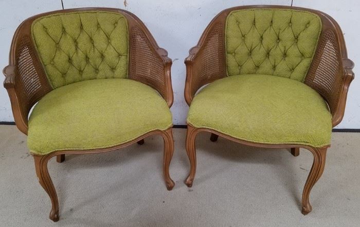 Vintage caned arm chairs