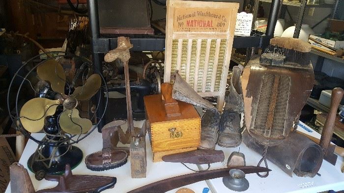 Antiques of all shapes and sizes, fans, bottle openers, boot jacks, shoe shine box, etc.