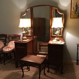 Antique dressing table with mirrors, bench, figural lamps