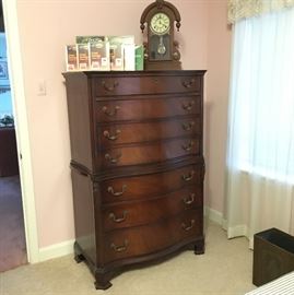 Vintage high chest of drawers.  Antique clock
