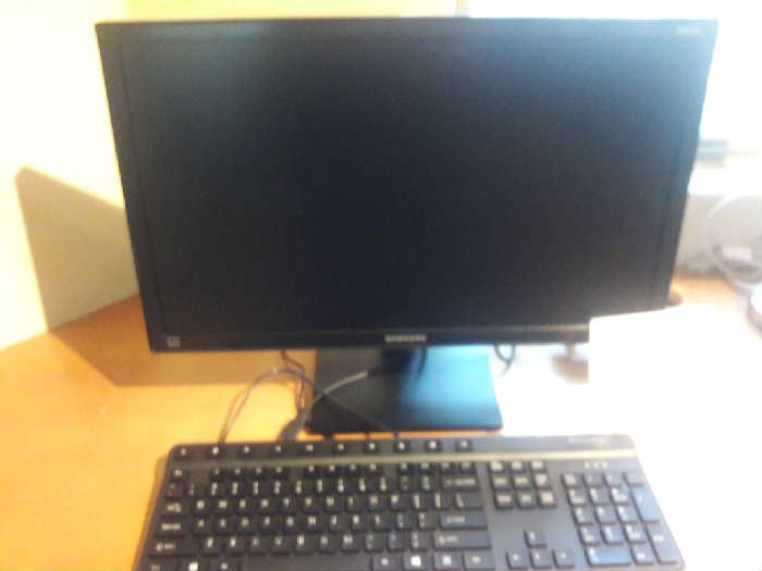 Computer monitor, keyboard and speakers