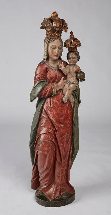 Italian 19C Madonna Child Carved Wood 51" Statue  Italian 18th or 19th century polychrome wood carving of the madonna and child. The figural carved statue is realistically painted with highly detailed carving. Inscribed on the base; Aves Maria Laureto. The crowns are removable. Laureto is an Italian town just south of Fasano. The family history of the carving is that family members were married in Italy and received the sculpture from a local church. In good condition with age cracks, paint loss and a glued finger on the child. We had difficulty determining the specific age of the carved figure. Appears to be well over 150 years old and could be considerably older. Measures 51 inches high.