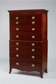 English Georgian Mahogany Tall Chest Butler's Desk   English Hepplewhite Georgian two-piece mahogany chest on chest. Chest is fitted with a butler's desk and a removable inlaid mahogany cornice. The two simulated drawer fronts open to reveal a felt-lined butler's desk. In good overall condition, original pulls, has age cracks on the sides and some chips and veneer repairs, the two lower drawers have replaced bottoms. Measures 74.6 inches high x 43 inches wide x 21 inches deep.