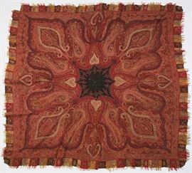 Old 19C Kashmir Hand Made Woven Red Paisley Shawl  Kashmir hand woven 19th century red paisley shawl. The 19th century shawl has a black center medallion that is apparently signed by the maker in white thread. The shawl is pieced and hand sewn, embellished with finely detailed embroidery. Good condition, corners have fringe and edgewear, one 3.5 x 3.5 corner missing and overall has some thinness and small holes in the black center. Measures 72 x 67 inches. 