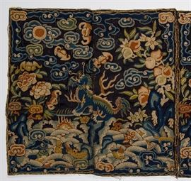 Signed Chinese 18/19C Tapestry Silk Panel Textile      Chinese 18th or 19th century hand embroidered double silk panel. The early Oriental textile - tapestry from the 18th or 19th century depicts foo lions amongst exotic rich blue clouds and foliage. Tiny embroidered stitches include forbidden stitch and a gold thread border. Rich blue and green vegetable dye colors. Signed in Chinese characters on the back. The panel could be a Chinese Imperial double rank badge. In good condition, some minor splits in indigo blue silk fabric. Embroidery all intact. Measures 22.25 inches x 11 inches. 

From the estate of Dr. J. Ward Hall, dentist to the Chinese Imperial Family, personal dentist to the emperor. The early antique textile will include photos of the interior of Dr. Hall's Shanghai residence taken in the 1880's showing many of the Chinese textiles on the wall. Textile panel will also include original Jordan family note cards, with the Jordan family crest.

Dr. James Ward Hall (1849-1908) g