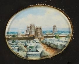 Collection 19C Miniature Hand Painted Scenes India    The 19th century collection consists of 17 hand painted scenes including temples, beachscapes, farmers and elephants. They are mounted together in a matted frame. All but two of the miniature paintings are protected with a separate beveled glass cover. Family historical information revealed that they were brought from India in 1864 by Reverend Edward Webb, missionary, the grandfather of Richard B. Webb. Information written on reverse. Good condition. They range in size from .7 to 2 inches long. Frame measures 10.7 inches high x 12.7 inches wide. 