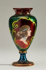 French Enamel on Copper Art Nouveau Portrait Vase  French enamel on copper Art Nouveau portrait vase. Early 20th Century vase has a hand painted portrait of a woman. Body of vase decor with dragonflies and flowers. Unsigned. There is a small area of enamel loss on side of the base at the connecting ring. There is also a tiny .5 inch chip on the bottom rim. Measures 6.5 inches high x 3.2 inches diameter. 