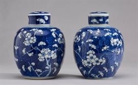 Signed 19C Chinese Hawthorne Porcelain Ginger Jars   Two signed 19th century Chinese Hawthorne porcelain ginger jars. The classic blue and white glazed jars are hand-painted in the decorative Hawthorne pattern. Signed with an underglaze four character mark within a double circle. In good condition, one of the lids has a flake on the edge. A near matched pair. Measure 5.5 inches in height and 4 inches in diameter.