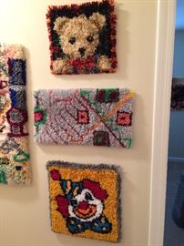 More hook rug wall hangings made by owner
