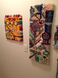 More rug hook wall hangings made by owner