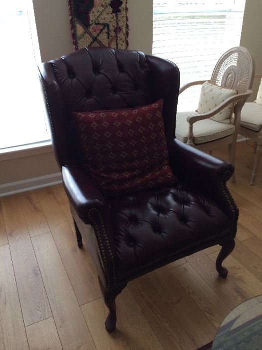 Maroon leather wingback chair