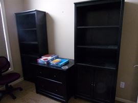 Office with two book shelving/storage units, black lateral two drawer file
