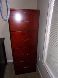 Wood four drawer file cabinet