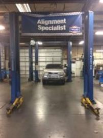 Ben Pearson asymmetrical 9000 lb. automotive lift. Model 9000AI. Tested operational.
