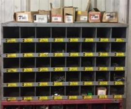 Metal 40 Bin Cabinet / Assorted Wheel Weights and Hardware.
