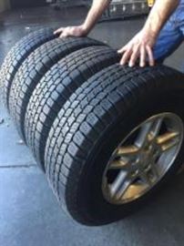Set 4 Jeep Aluminum Wheels and Good Year Rangler Tires size LT225/75R16 (tires appear to be almost new).