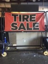 Rolling Tire Rack w/ Banner

D: 72” W x 90” H