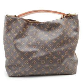 Louis Vuitton Sully PM Handbag: A Louis Vuitton Sully PM handbag. This monogram print coated canvas bag features a center zipper closure, a thick Vachetta leather handle, brass hardware, matching leather piping to the sides and a folded base. The interior is lined in canvas and is marked with the date code, “SDO142”. A dust bag accompanies the handbag. Made in the United States.