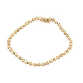 14K Yellow Gold Round Laser-Cut Link Bracelet: A 14K yellow gold round laser-cut link bracelet.