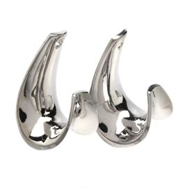 14K Yellow Gold Spiral Earring Jackets: A pair of 14K yellow gold earring jackets featuring a spiral ribbon form. Designed to be worn with postback stud earrings.