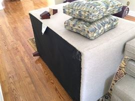 Love seat showing back legs off