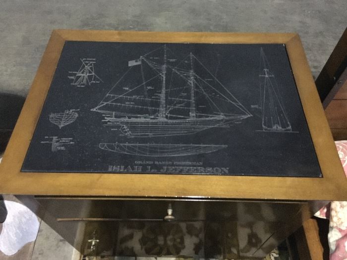 Pair of end tables/night stands featuring inset top black slate engraving with plan of the schooner  Isaiah L. Jefferson.    