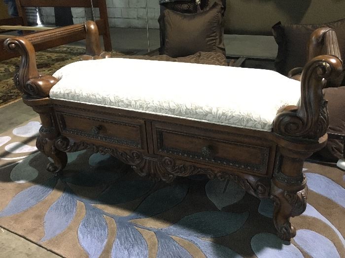 Carved settee with two drawers for storage