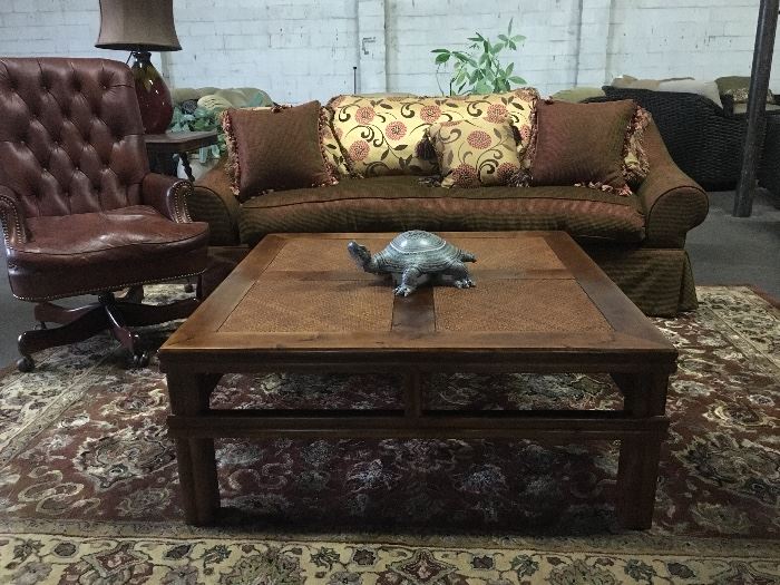 Chinese four paneled Coffee table with Palecek furniture label,  button back office chair by Hickory  chair and Rene Cazres sofa with iridescent upholstery. 