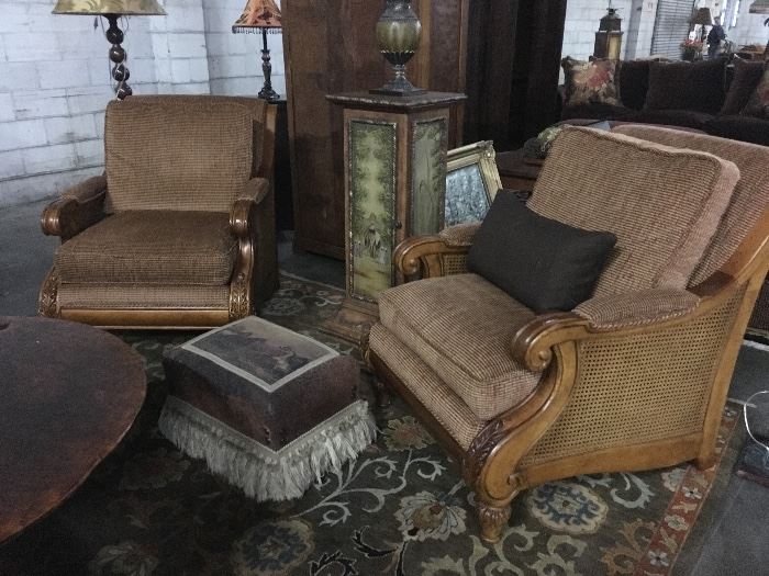 Pair upholstered arm chairs with tassel detailed equestrian foot stool