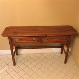 Side table / sofa table located in women’s restroom 