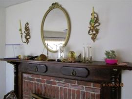 Hand built mantle made by the homeowner. Beautiful work.