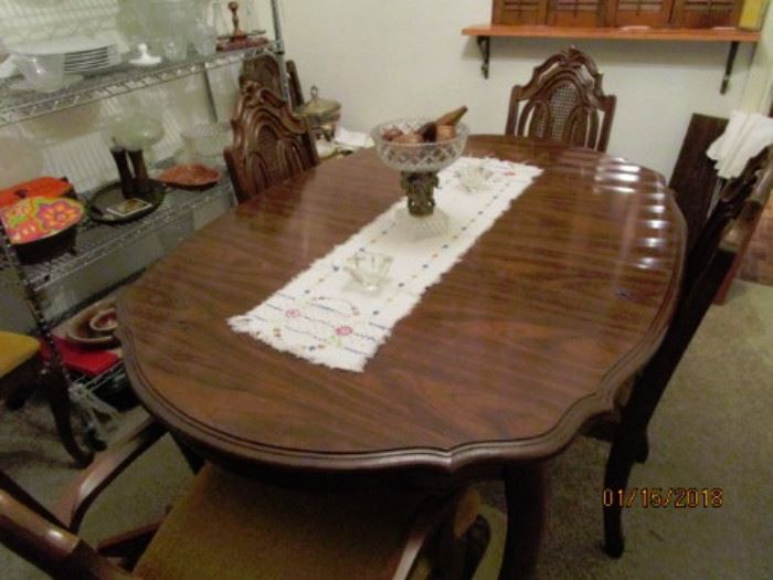 Dining table with 6 chairs.  4 side chairs, 2 arm chairs.