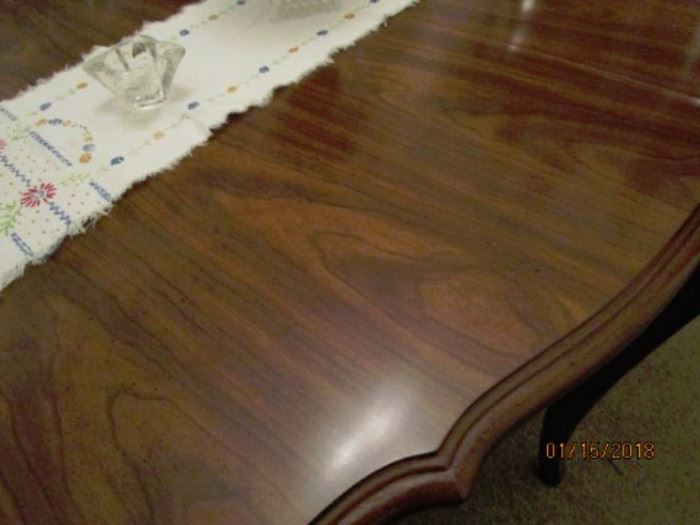 Dining table surface.  In excellent condition as table cover was always on the table.