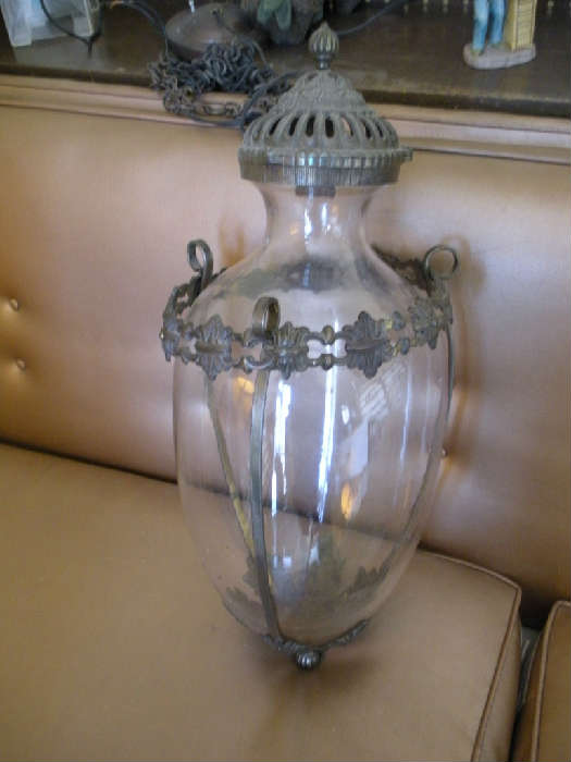 Tall hanging show globe. Damage to upper lip which is concealed by the metal lid.