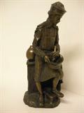 10 1/2" signed and numbered bronze of an apothecary.
