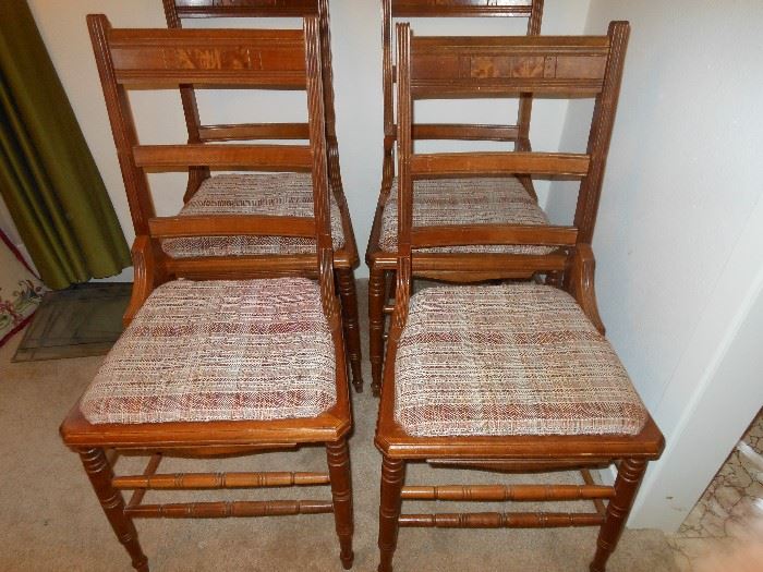 4 matching antique press back chairs