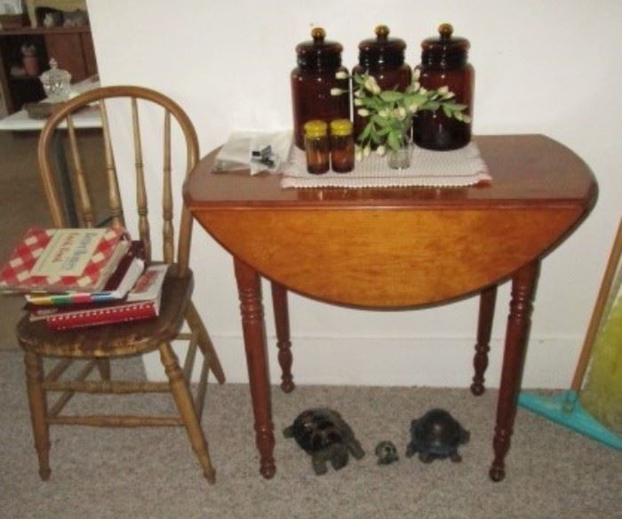 Vintage drop leaf table, Amber glass jars, antique wooden chair