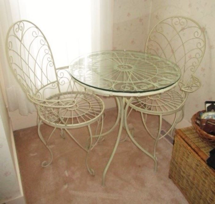 Metal table w/ glass top and 2 chairs