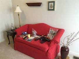 Love this red loveseat, more great accessories