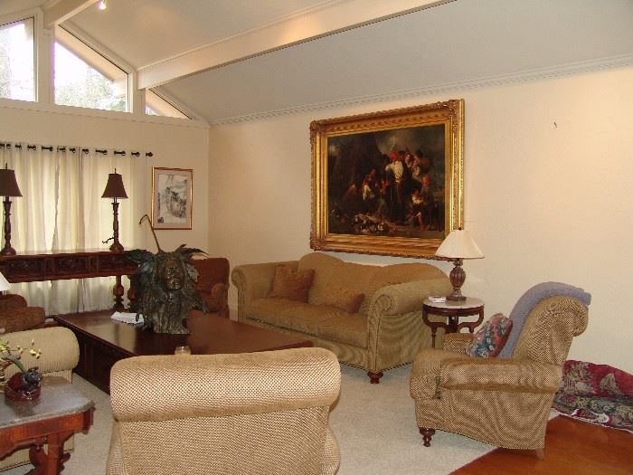 Living room opposite view with oil painting and furniture