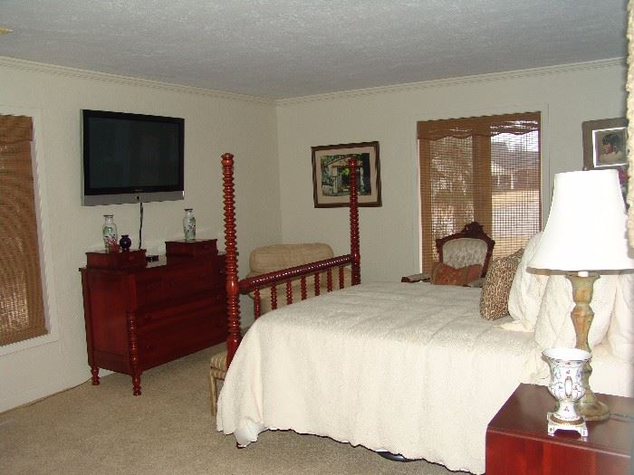 Guest bedroom with solid cherry Davis Cabinet Company  chests and poster bed and night stand