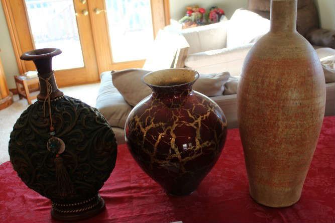 Lot #20 Decorate your home with these lovely large vases!
Detailed vase - 18 inches
Red & Gold Vase 15.5 inches
Lg Orange & Brown vase 21.5 inches