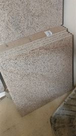 2X2 FLAME GRANITE SQUARES  OVER 2 DOZEN WITH CUT RAMP ENDS 