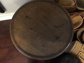 Top of round walnut table.
