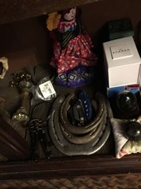 Horse Shoes, Utilitie Knives, Glass Doorknob, Ethnic Doll, Nick-Nacks.