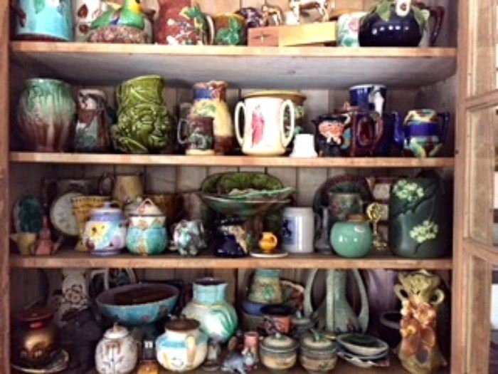 Cabinet full of Majolica and other Pottery