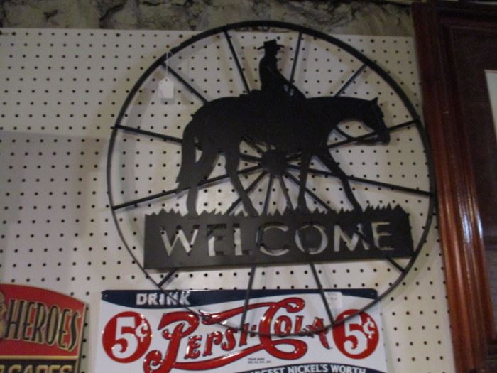 Welcome wagon wheel sign