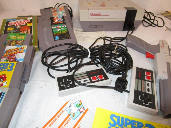 Nintendo NES-001  with accessories and games