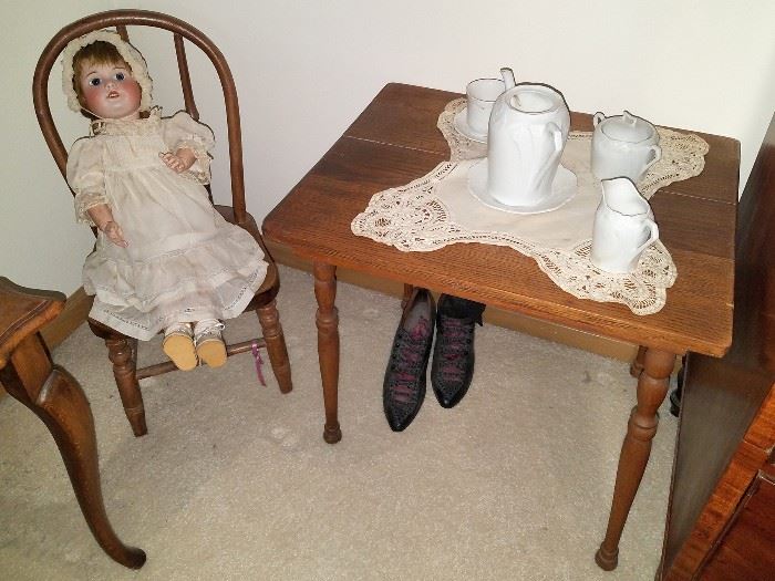 Doll table and chair. Antique German doll